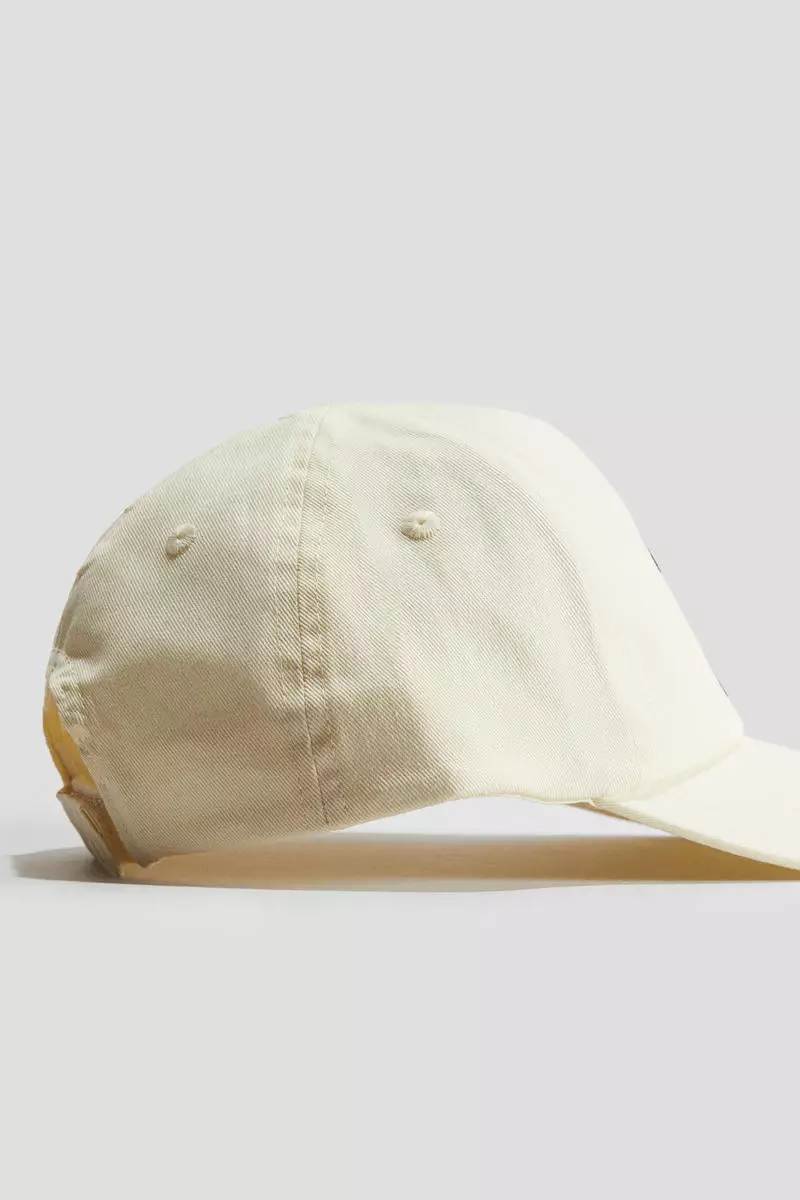Motif-detail cap
