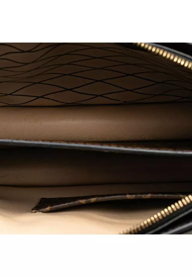 Pre-Loved Louis Vuitton Monogram Reverse Trunk Clutch
