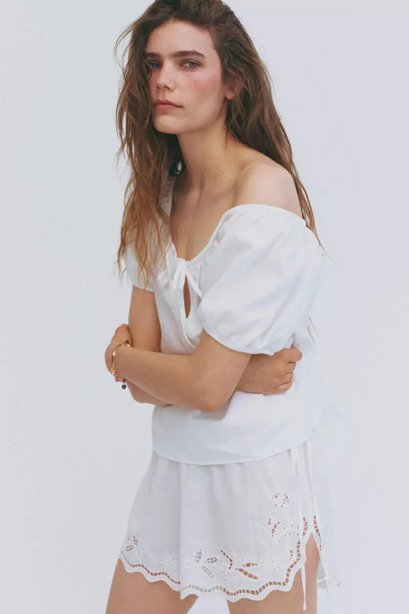 Puff-sleeved linen-blend blouse
