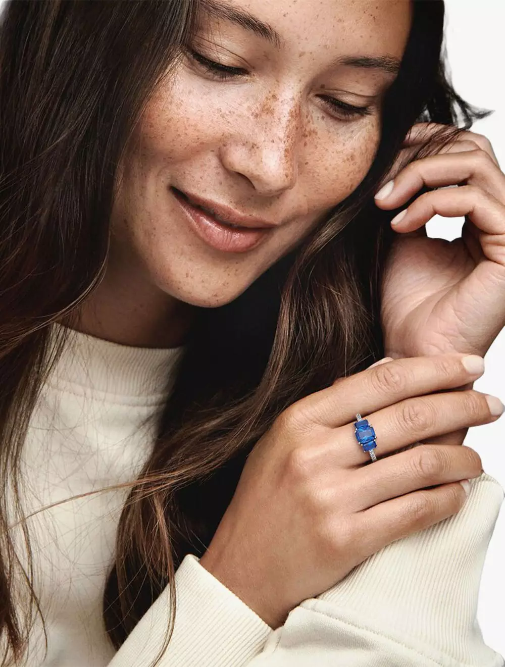 Sterling silver ring with princess blue crystal and clear cubic zirconia