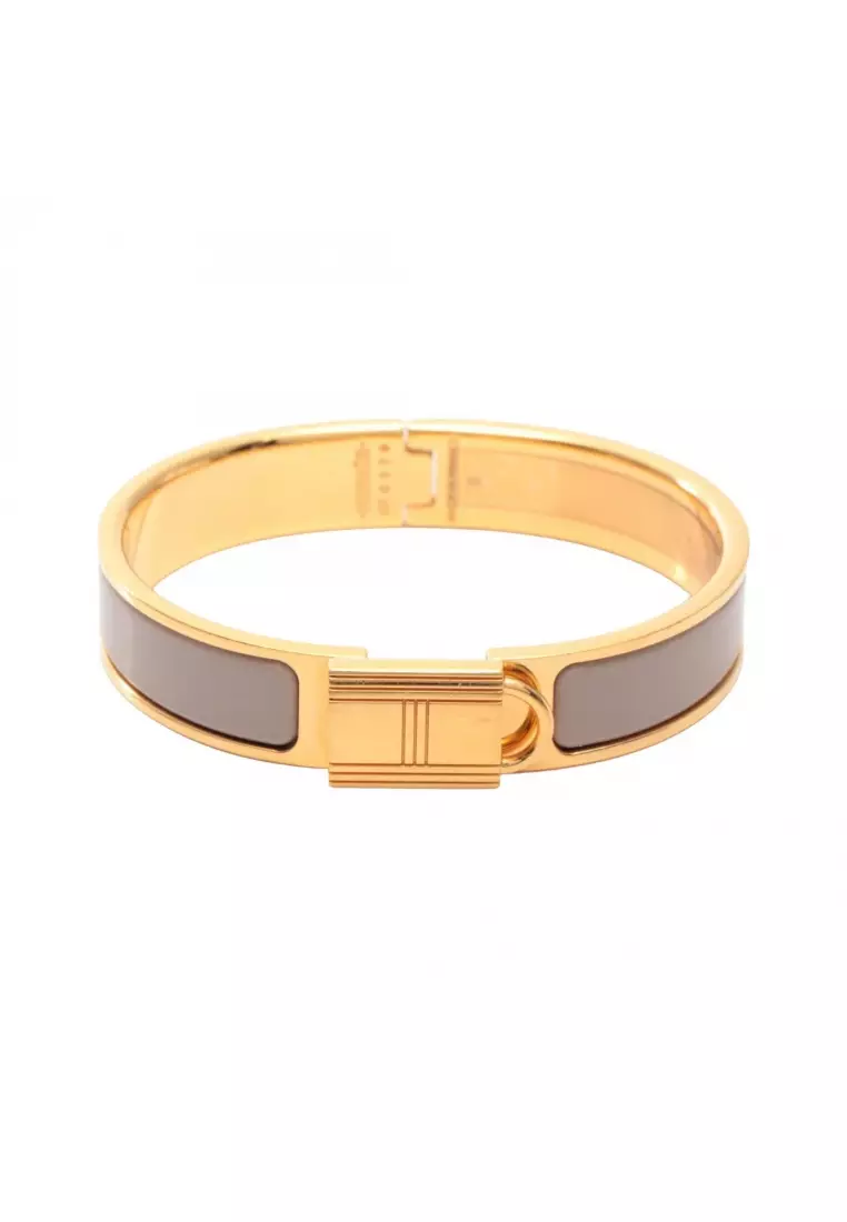 Pre-Loved Hermès Click Cadena PM bangle GP gold beige