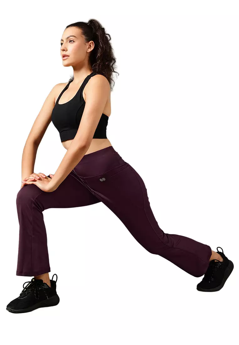 Clovia High Waist Flared Yoga Pants in Plum Colour with Side Pockets