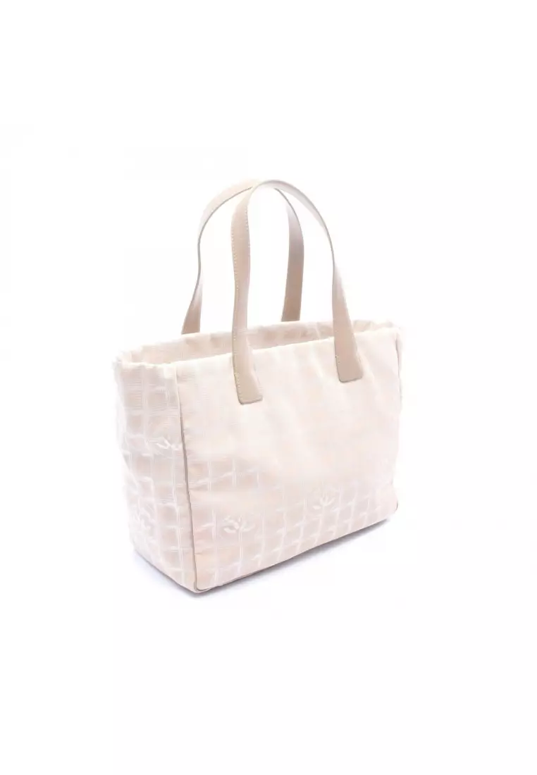 Pre-Loved Chanel New travel line MM Handbag tote bag nylon canvas beige gold hardware