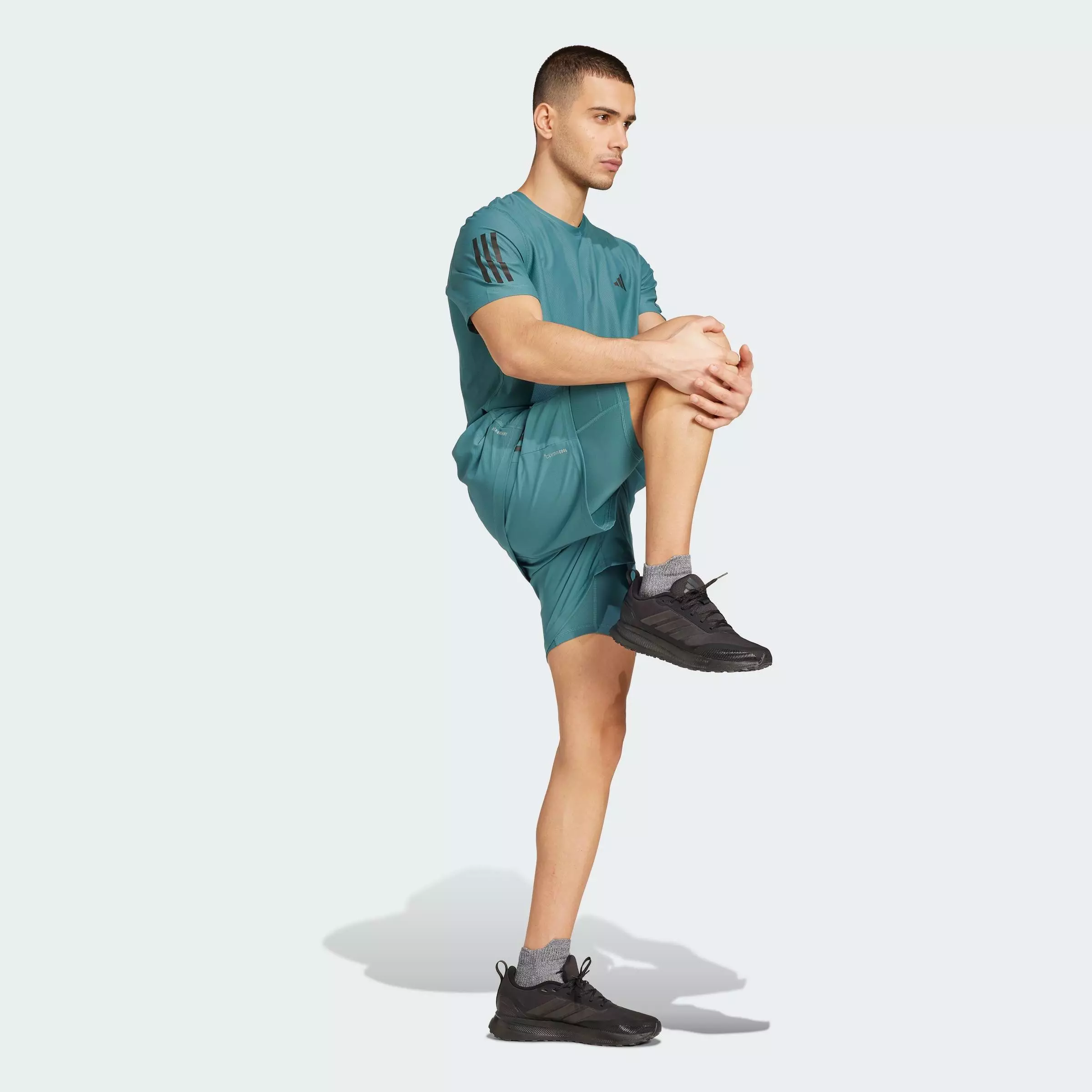 Buy ADIDAS Running Own the Run CLIMACOOL 2-in-1 Shorts Men Green