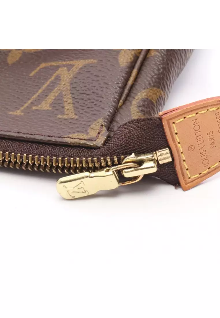 Pre-Loved Louis Vuitton Pochette Accessoires monogram Handbag PVC leather Brown