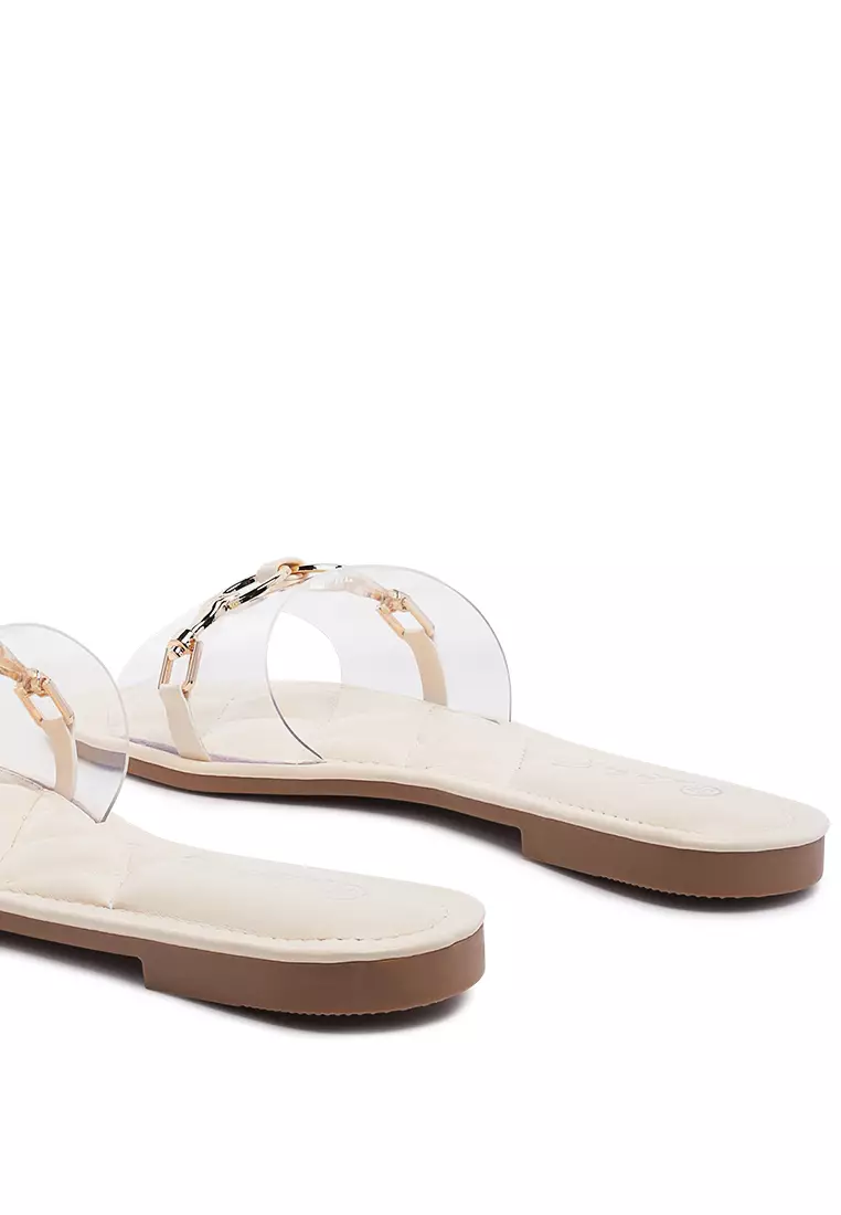 Clear Buckled Quilted Slides in Beige