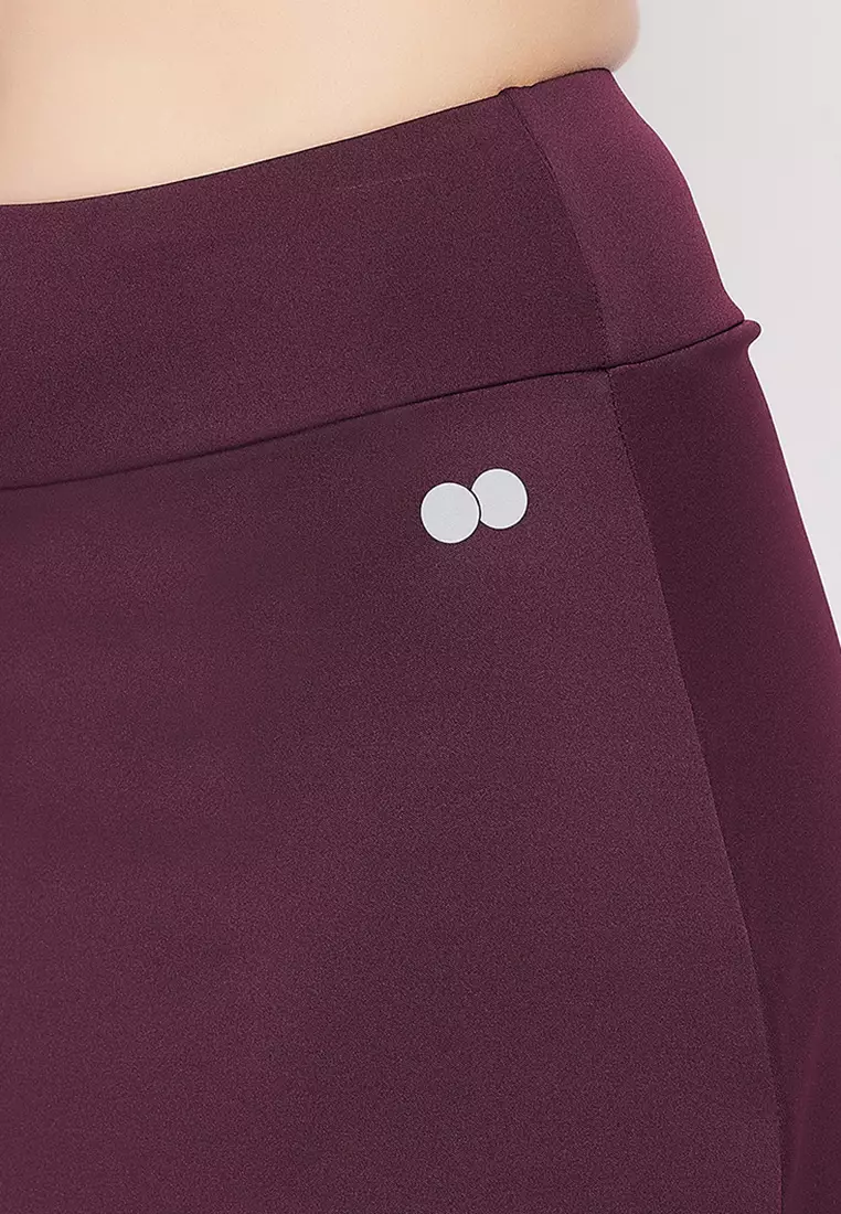 Clovia Snug-Fit High Rise Active Skirt with Attached Tights in Plum Colour