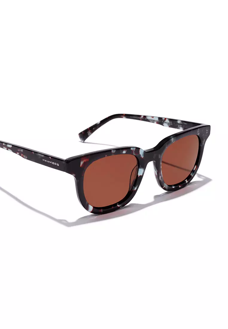 HAWKERS Blue Carey Brown Oasis Sunglasses For Men And Women, Unisex. Official Product Designed In Spain
