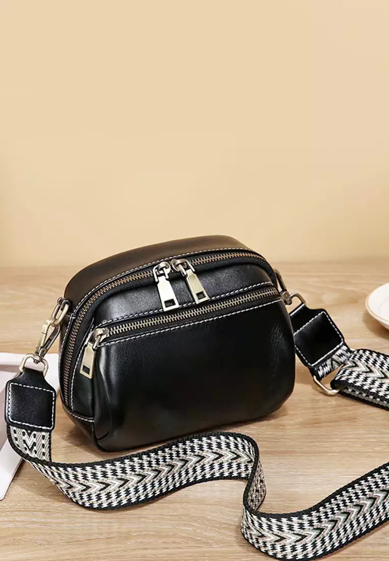 Double zipper outlet shoulder bag