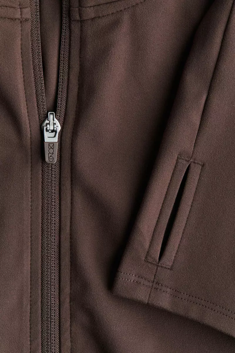 Zip-through sports jacket with SoftMove™