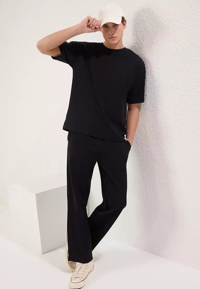 Black Oversize/Wide Cut Textured Tracksuit TMNSS25EM00010