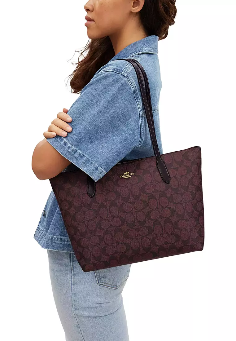 Coach signature zip tote top