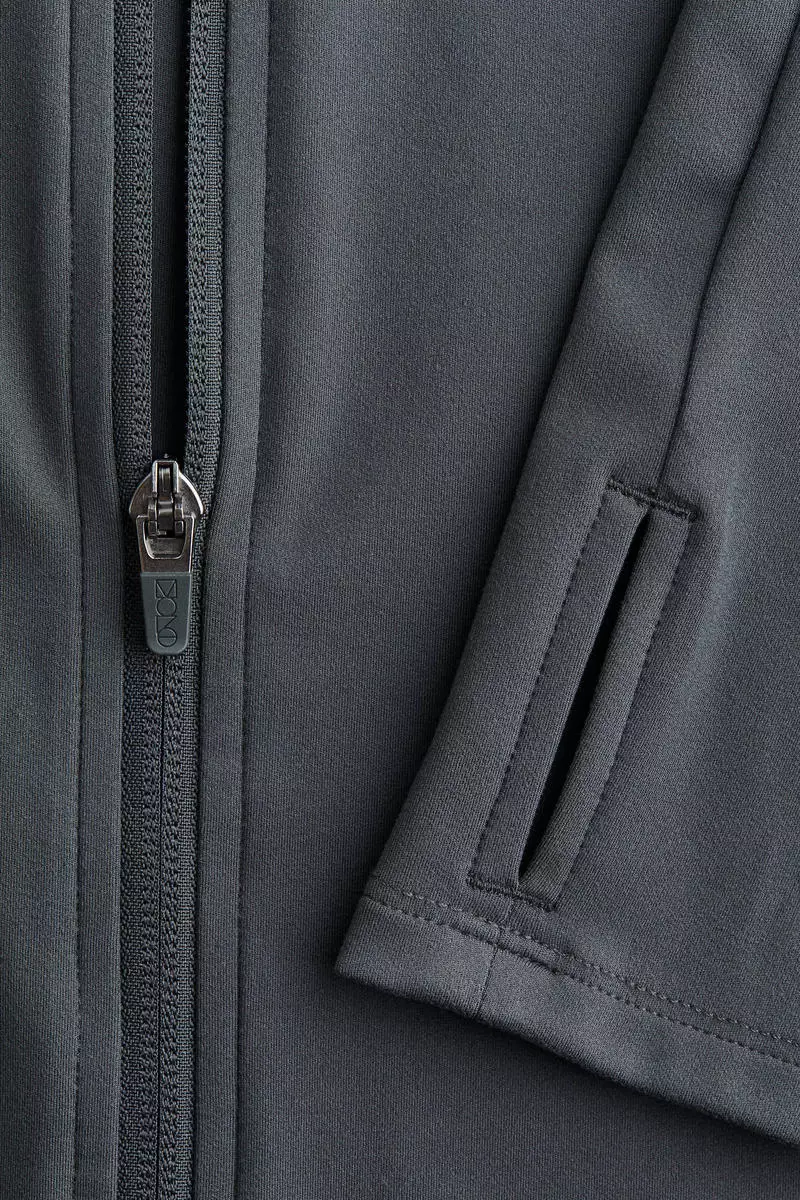 Zip-through sports jacket with SoftMove™