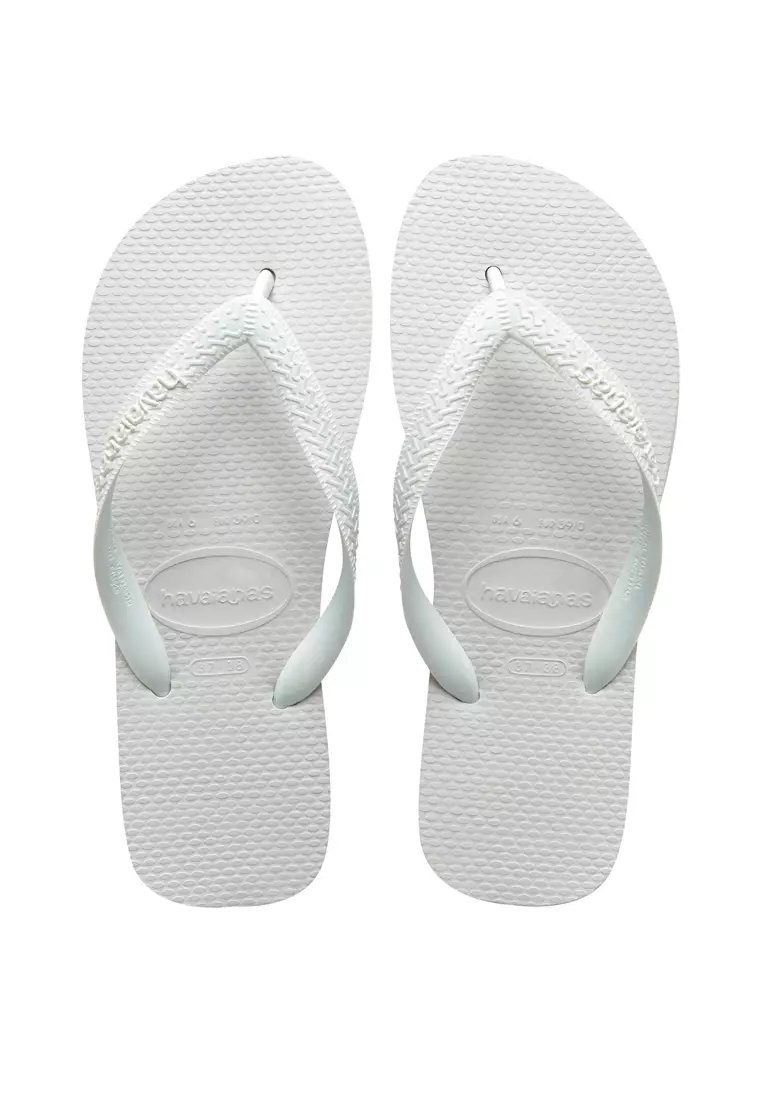 White designer sales flip flops