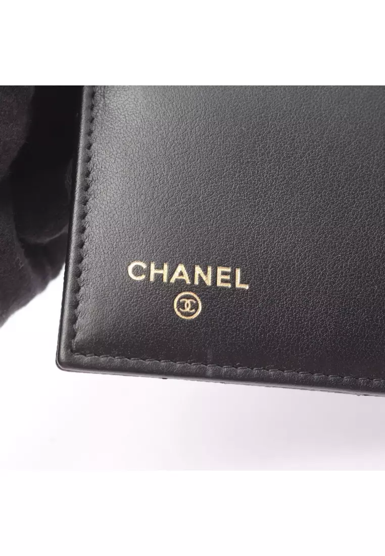 Pre-Loved Chanel matelasse trifold wallet Caviar skin black gold hardware
