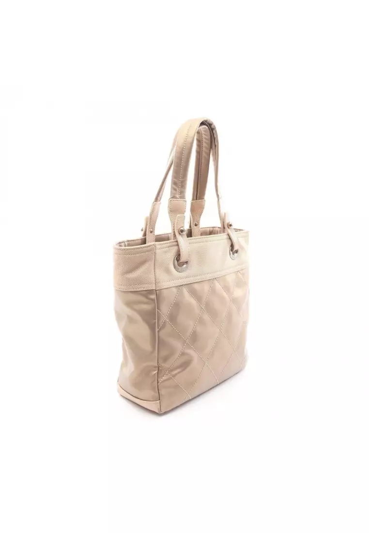 Pre-Loved Chanel Paris Biarritz PM Handbag tote bag Coated canvas leather Champagne Gold beige silver hardware