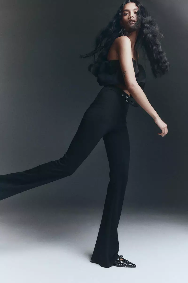 Flared belt-detail trousers