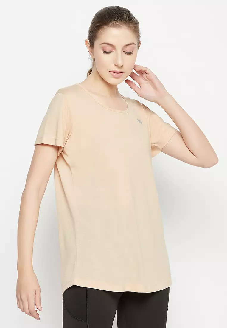 Clovia Comfort Fit Longline Active T-shirt in Cream Colour