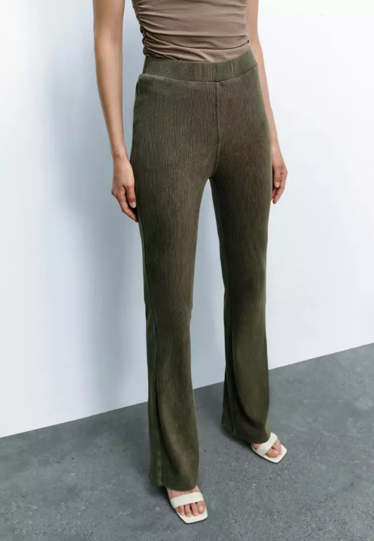 女复古风时髦松紧腰坑纹紧身高腰喇叭裤