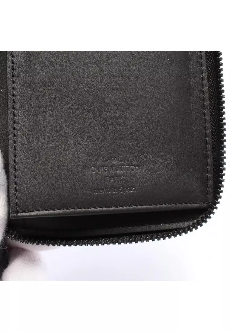 Pre-Loved Louis Vuitton zippy wallet Vertical monogram shadow round zipper long wallet leather black