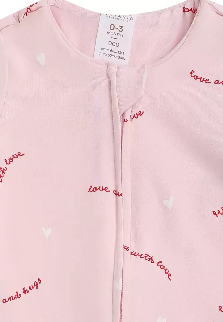 The Short Sleeve Zip Romper