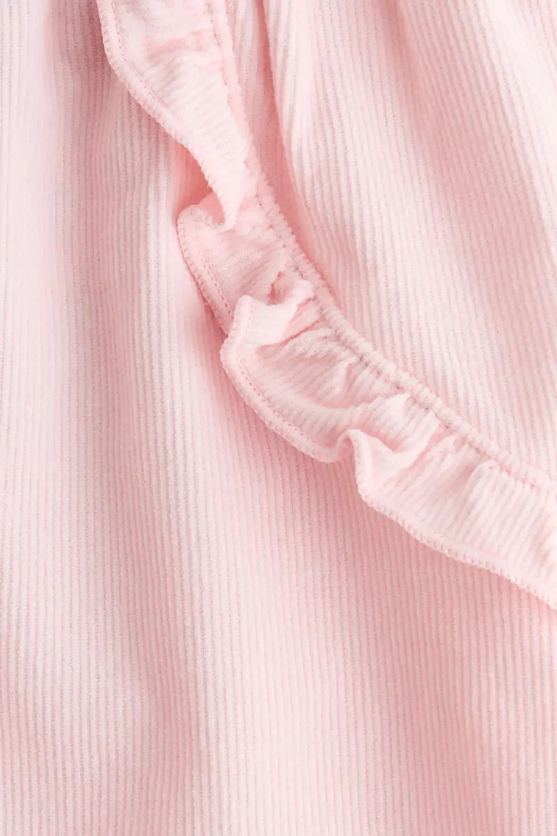 Frill-trimmed corduroy trousers