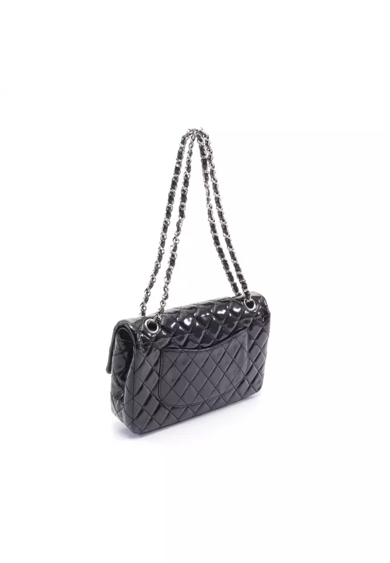 Chanel black leather flap bag clearance