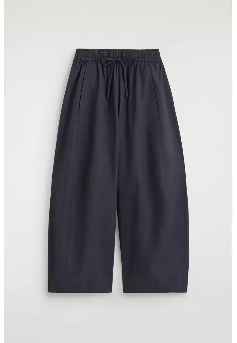 ELASTICATED BARREL-LEG TROUSERS