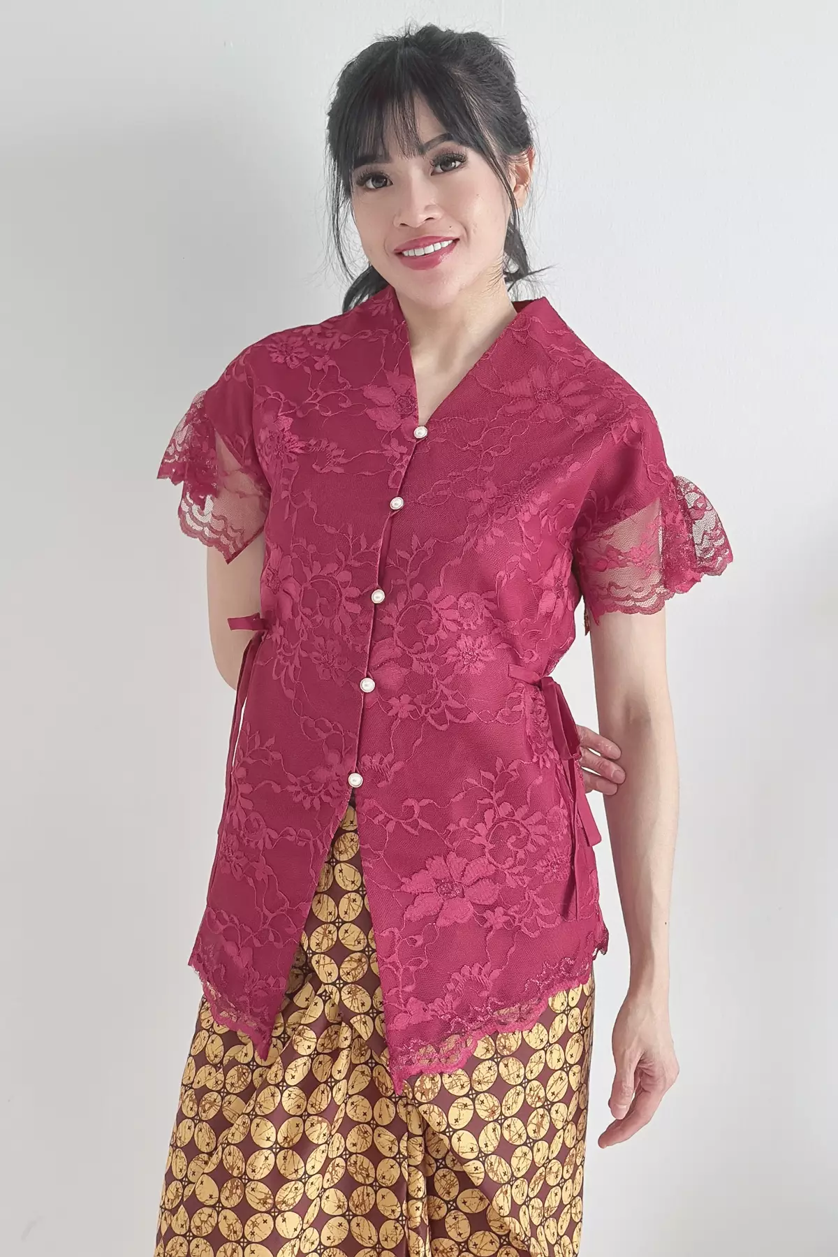 Reswara Wisanggeeni Maroon Kebaya Tied Up