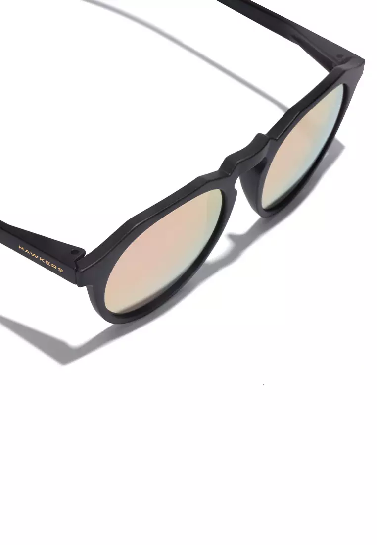 HAWKERS Carbon Black Rose Gold WARWICK Sunglasses for Men and Women, Unisex. UV400 Protection. Official Product designed in Spain