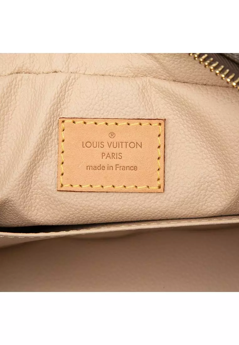 Pre-Loved Louis Vuitton Monogram Trousse Toilette 23