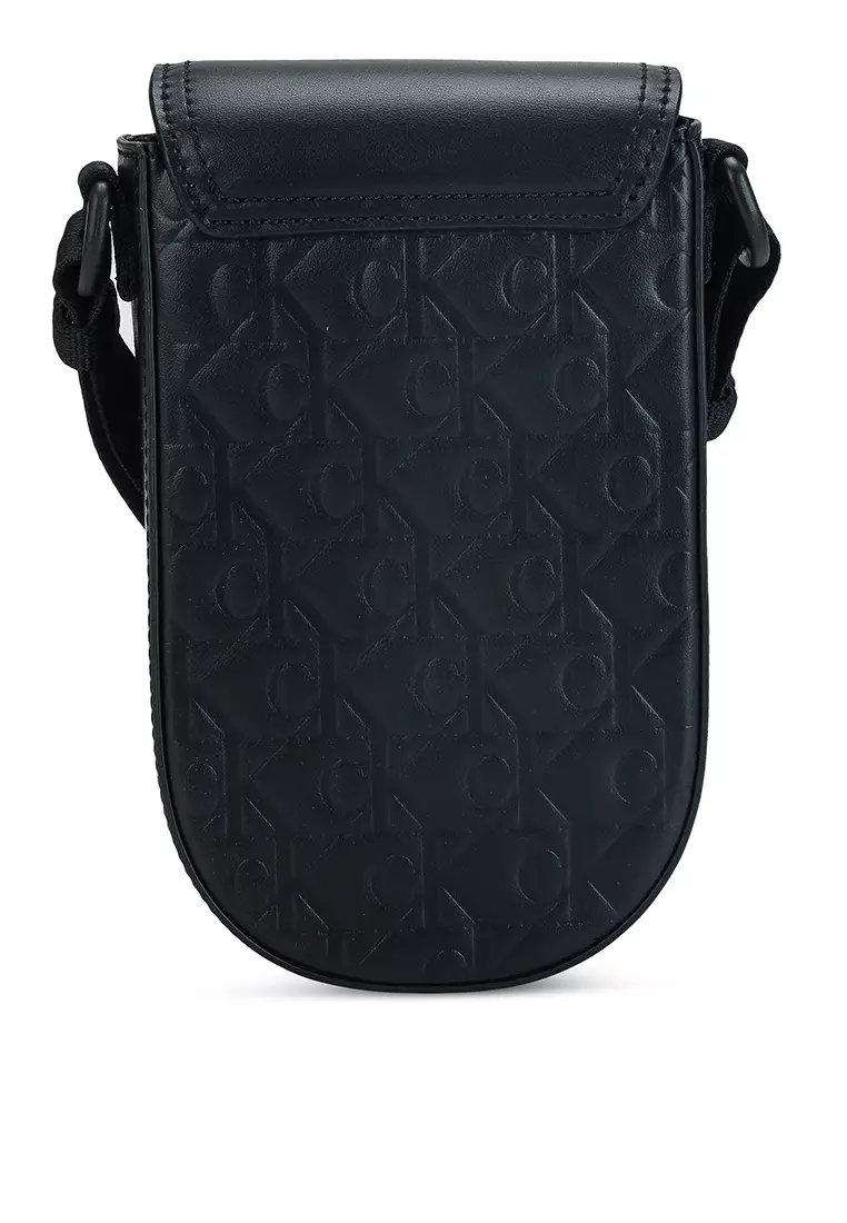 Calvin Klein Monogram Saddle Phone Bag - Calvin Klein Accessories 2024 ...