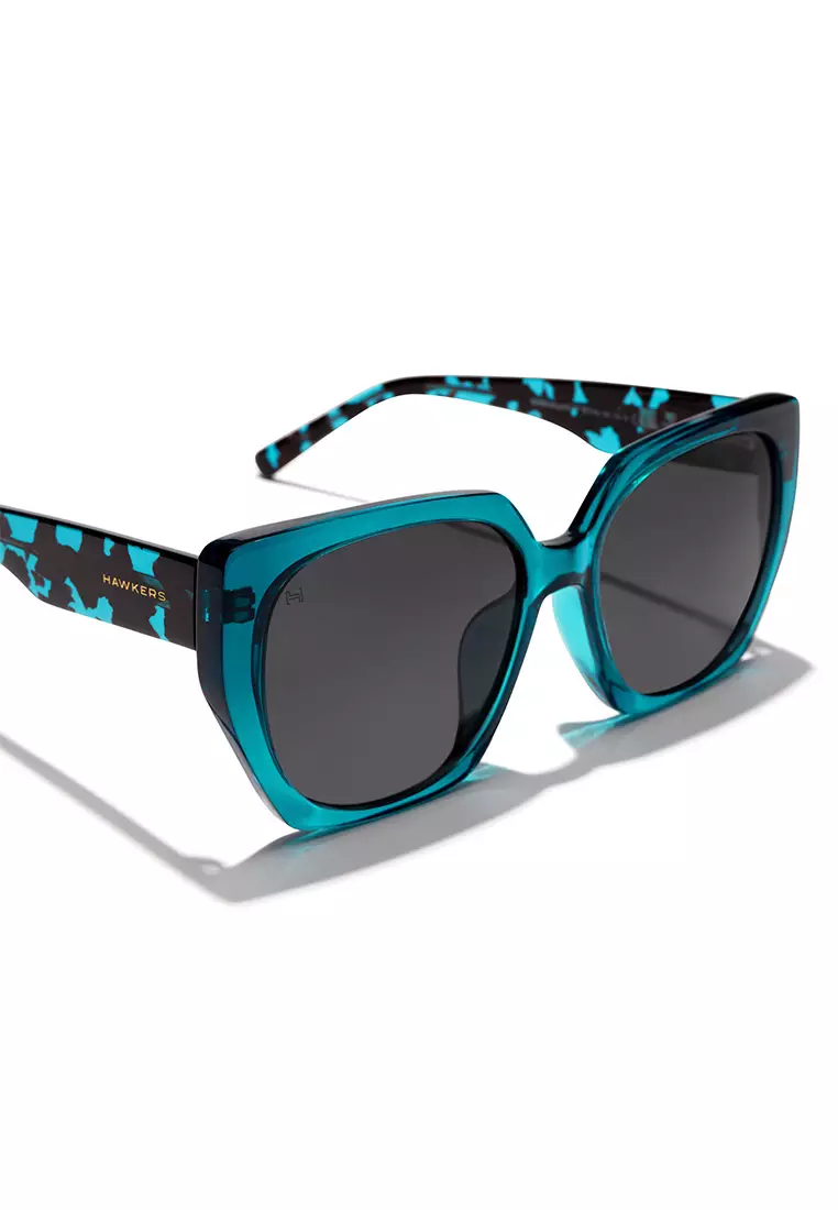 HAWKERS Blue Dark Eco Boujee Sunglasses For Women, Female. Official Product Designed In Spain