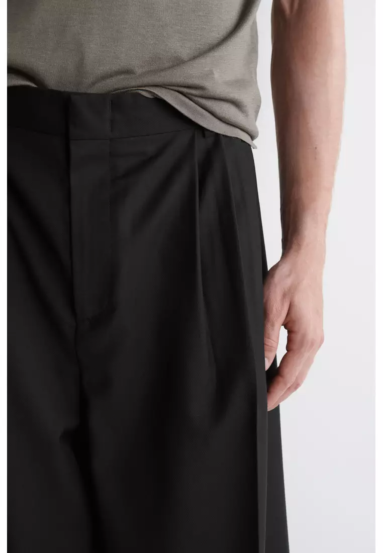 PLEATED WOOL WIDE-LEG TROUSERS