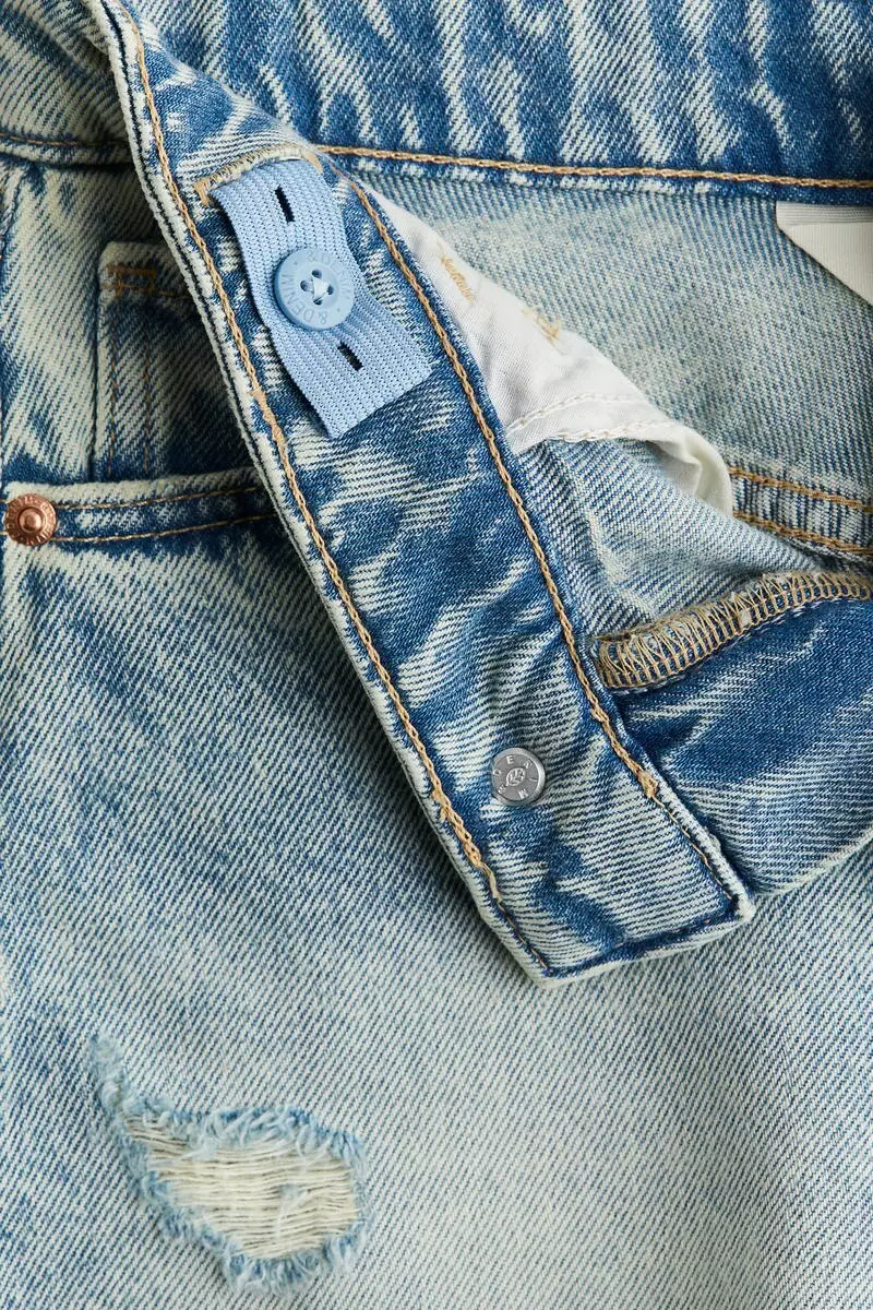 Raw-edge denim shorts