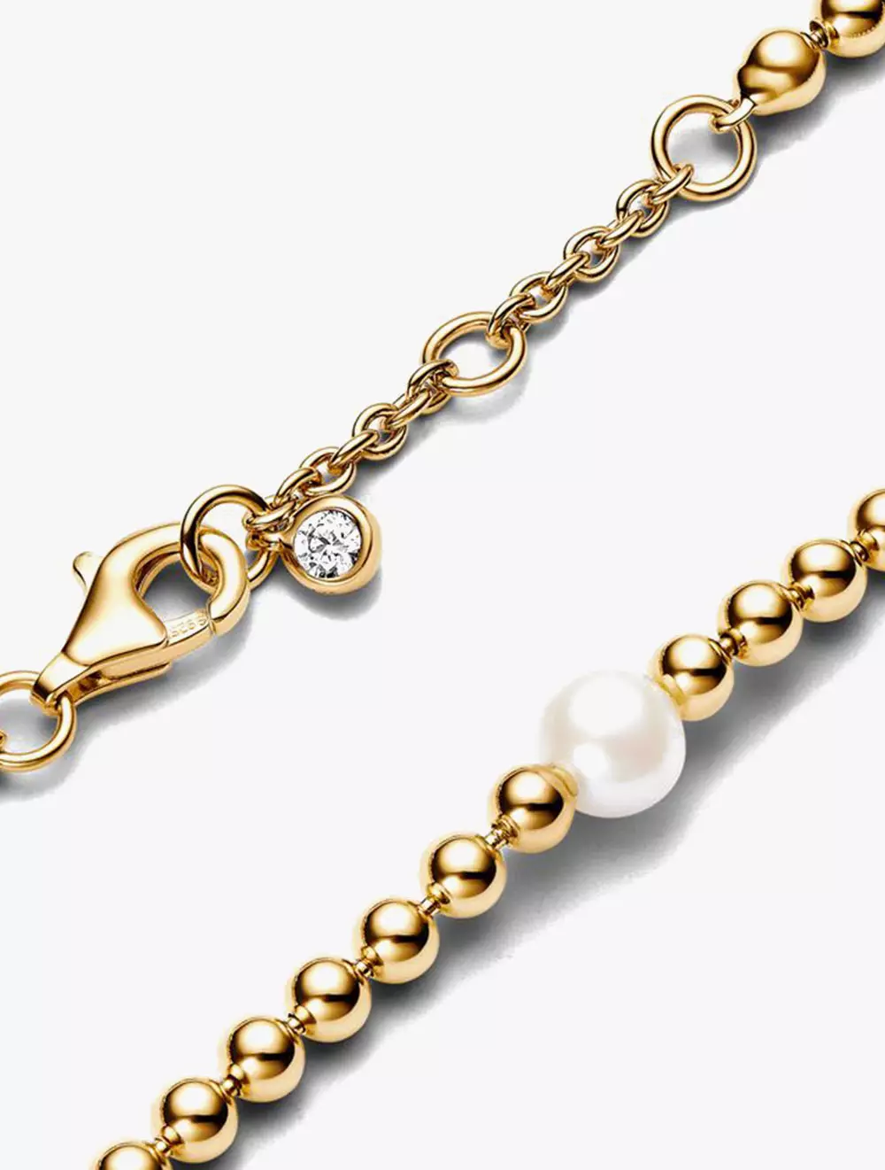 14k Gold-plated bracelet with white treated freshwater cultured pearl and clear cubic zirconia