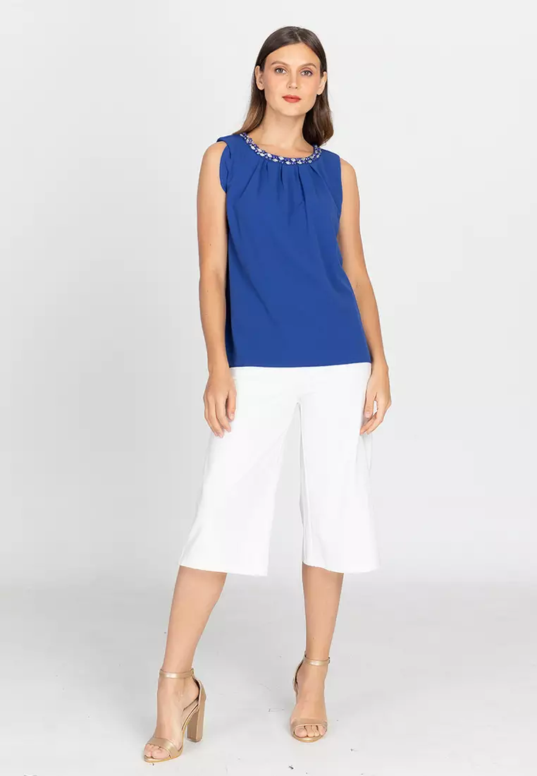 NOHEMI Ruffled Sleeveless Trapeze Top