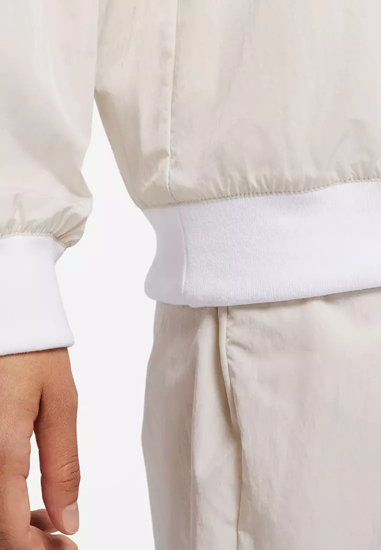 Sportswear Essential Women's Loose UV Woven Long-Sleeves V-Neck Top