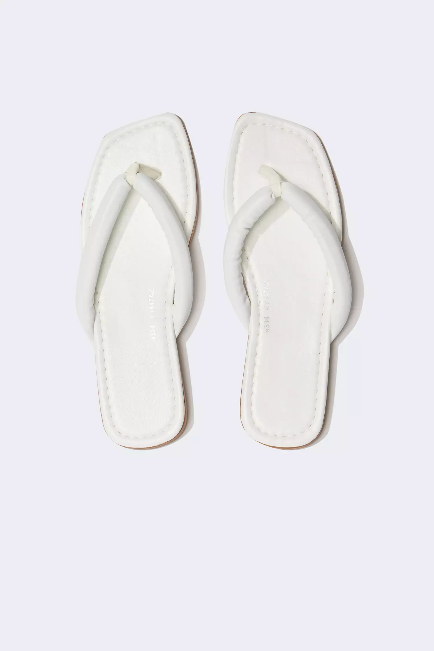 White leatherette slip on flip clearance flops
