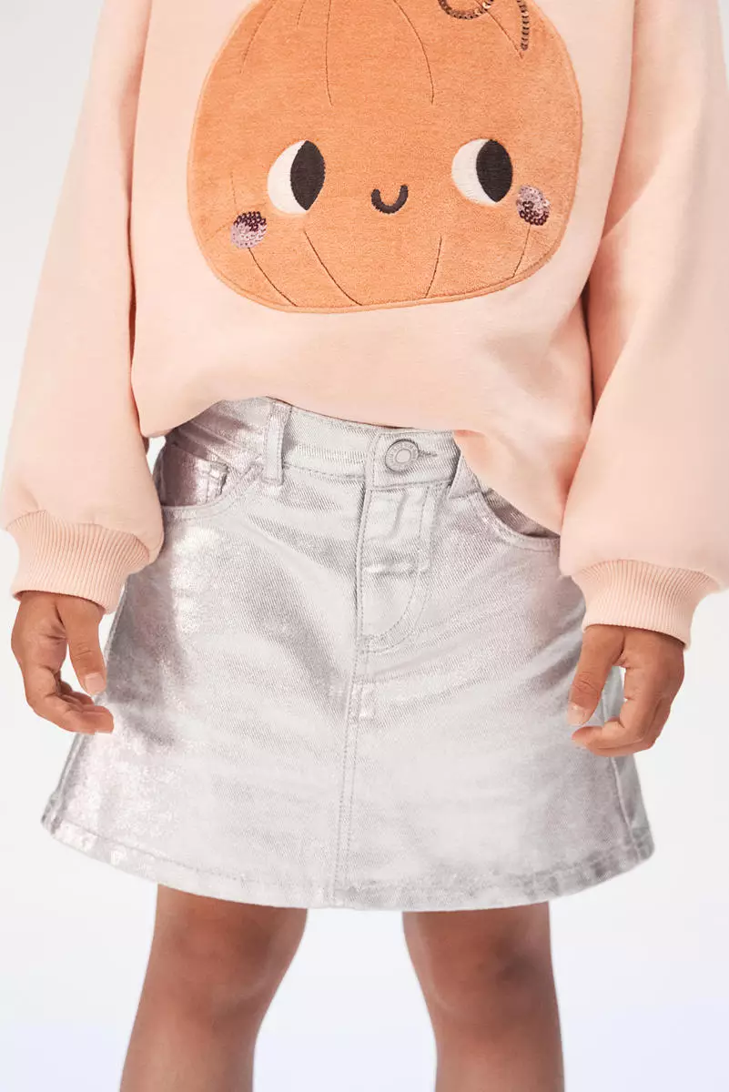 Shimmering denim skirt