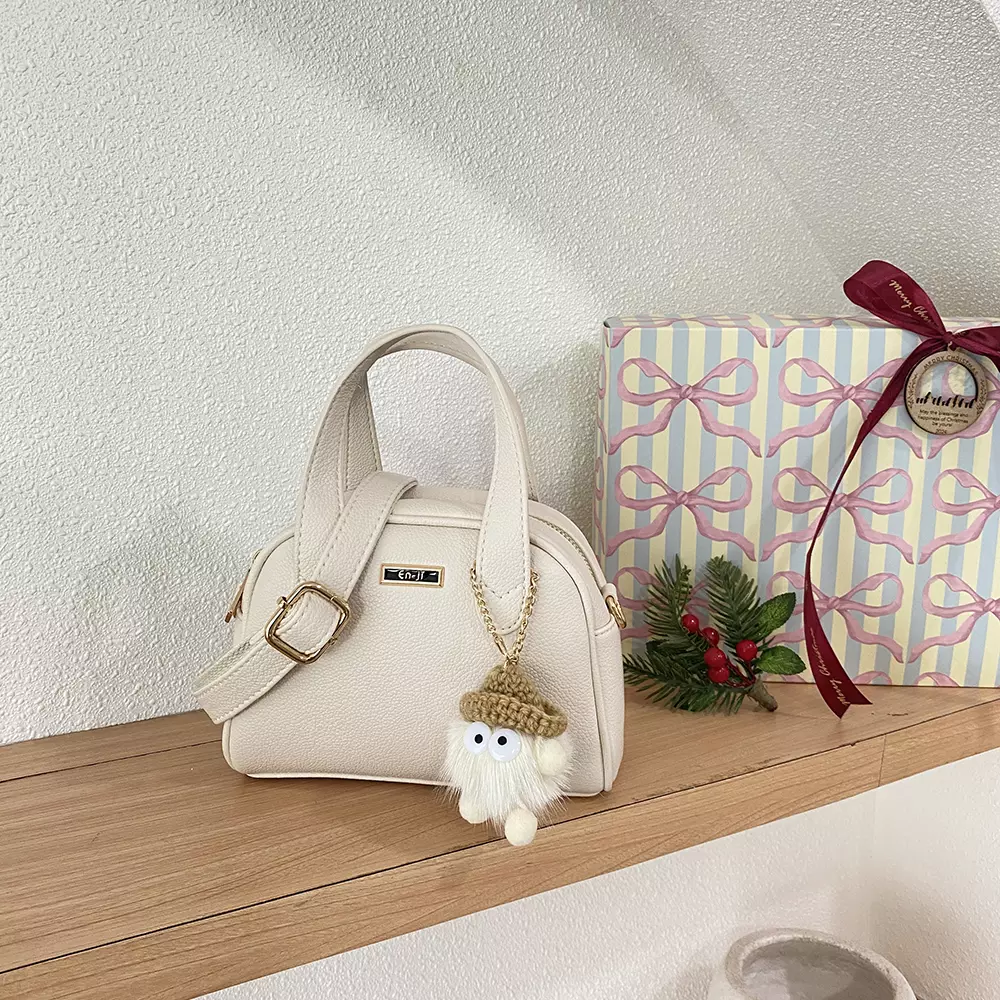 En-ji Bunwo Slingbag Wanita Warna Cream