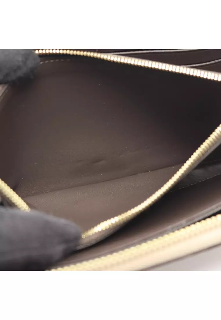 Pre-Loved Louis Vuitton Portefeuil comet Carré L-shaped zipper long wallet taurillon leather Gray beige
