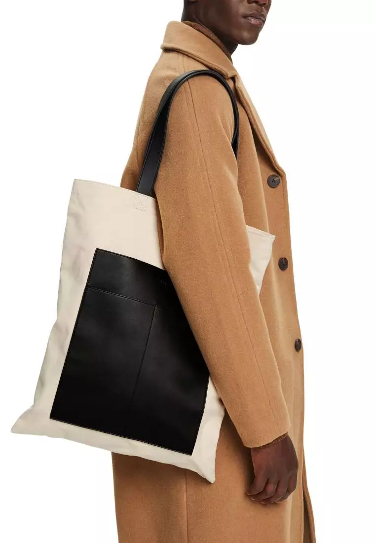 Faux leather trimmed canvas tote bag