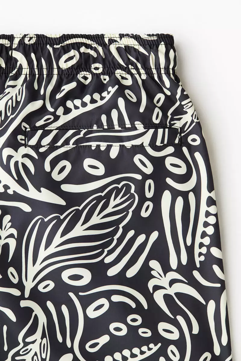 Patterned swim shorts