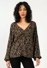 Savannah Tan/AOP: Leo