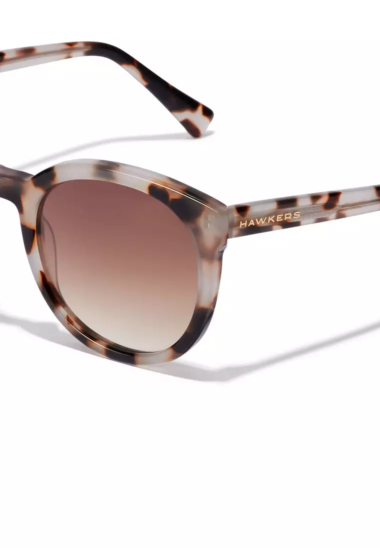 HAWKERS Leo Brown RESORT Sunglasses for Men and Women. Official Product Designed In Spain