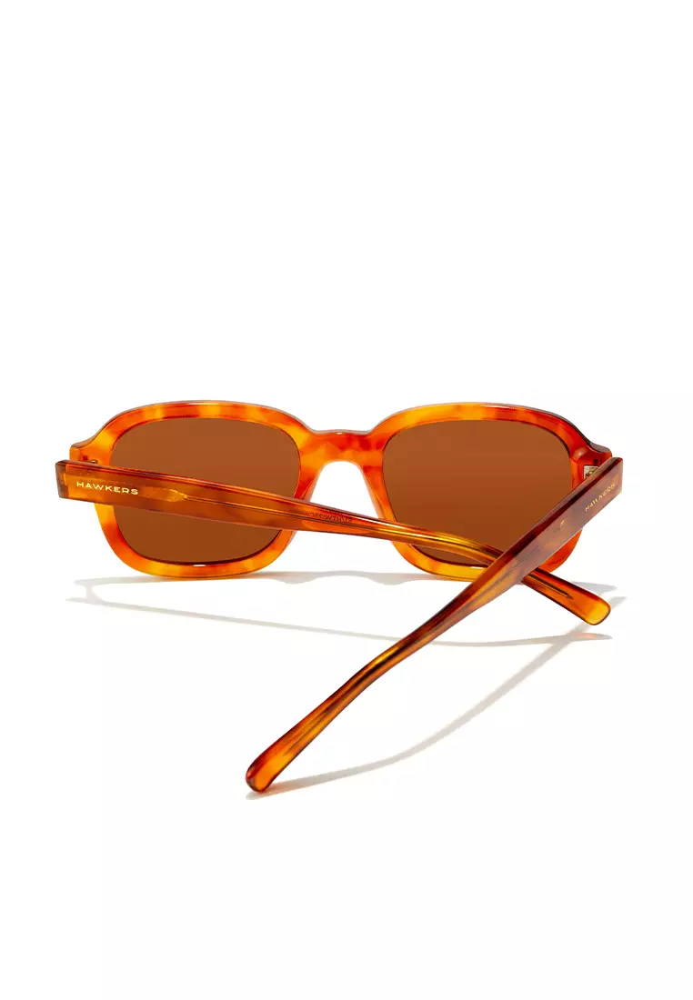 HAWKERS Carey Caramel TWIST Sunglasses for Men and Women, Unisex. UV400 Protection. Official Product designed in Spain