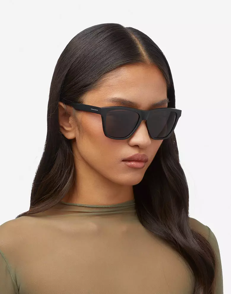 HAWKERS Black Dark ONE LS RAW. Sunglasses for Men and Women, Unisex. UV400 protection. Official product designed and made in Spain