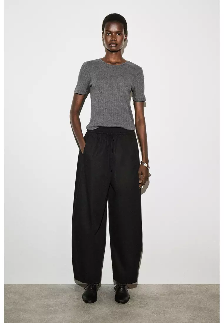 Buy COS ELASTICATED BARREL-LEG TROUSERS 2026 Online | ZALORA