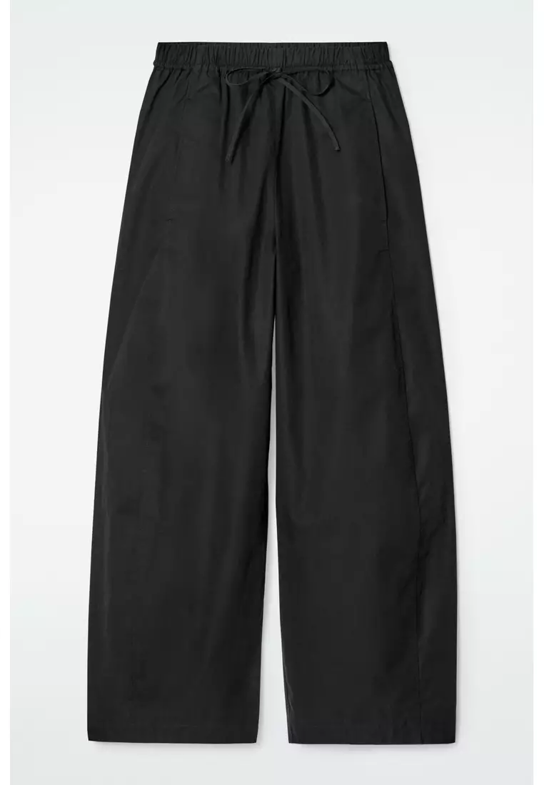 ELASTICATED BARREL-LEG TROUSERS